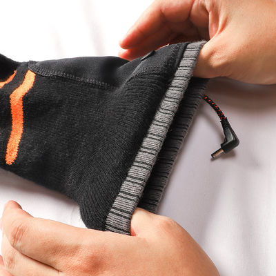 Chaussettes chauffées thermiques électriques épaisses chaussettes chauffées rechargeables noires avec une bonne élasticité