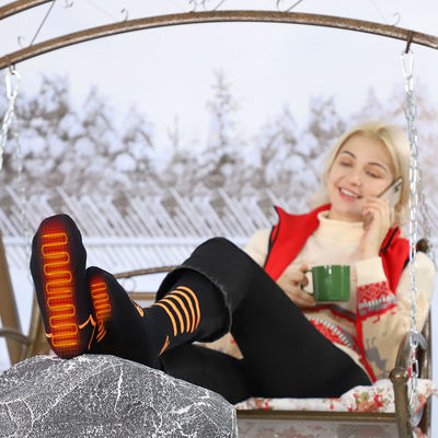 Chaussettes chauffées thermiques électriques épaisses chaussettes chauffées rechargeables noires avec une bonne élasticité