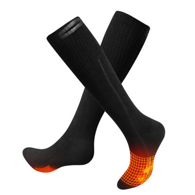 La batterie épaisse de coton d'hiver de femmes d'hommes a chauffé le chauffage isolé thermique électrique de chaussettes