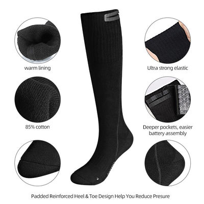 La batterie épaisse de coton d'hiver de femmes d'hommes a chauffé le chauffage isolé thermique électrique de chaussettes