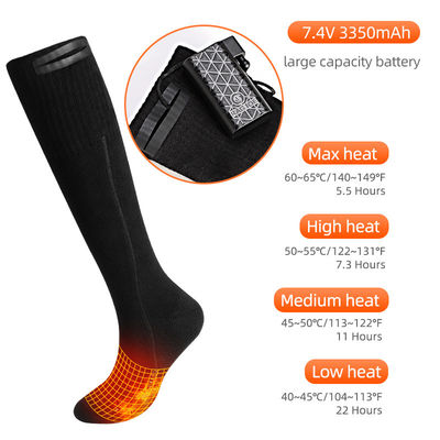 La batterie épaisse de coton d'hiver de femmes d'hommes a chauffé le chauffage isolé thermique électrique de chaussettes